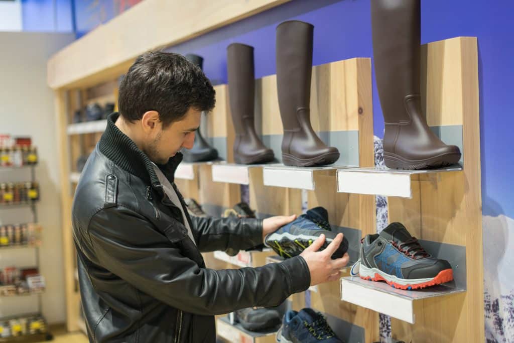 Man shopping for shoes.